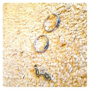 Two sets of earrings ,Honda in a loop,horseshoes